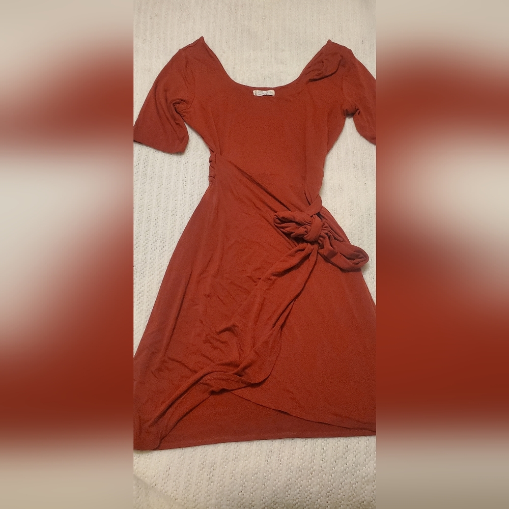 Burnt orange NWOT never worn Maurices. Medium